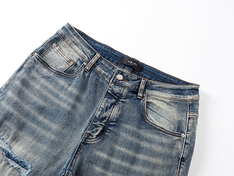 AMIRI Light Blue Distressed Appliqué Jeans — detail